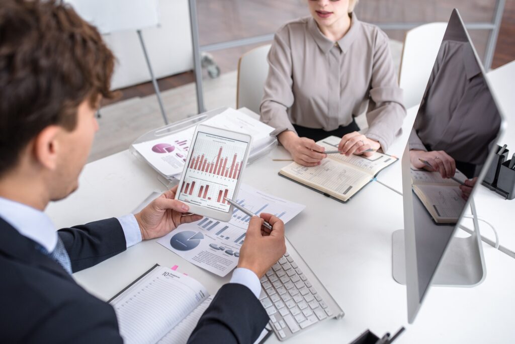 business people analyzing marketing and finance report 1